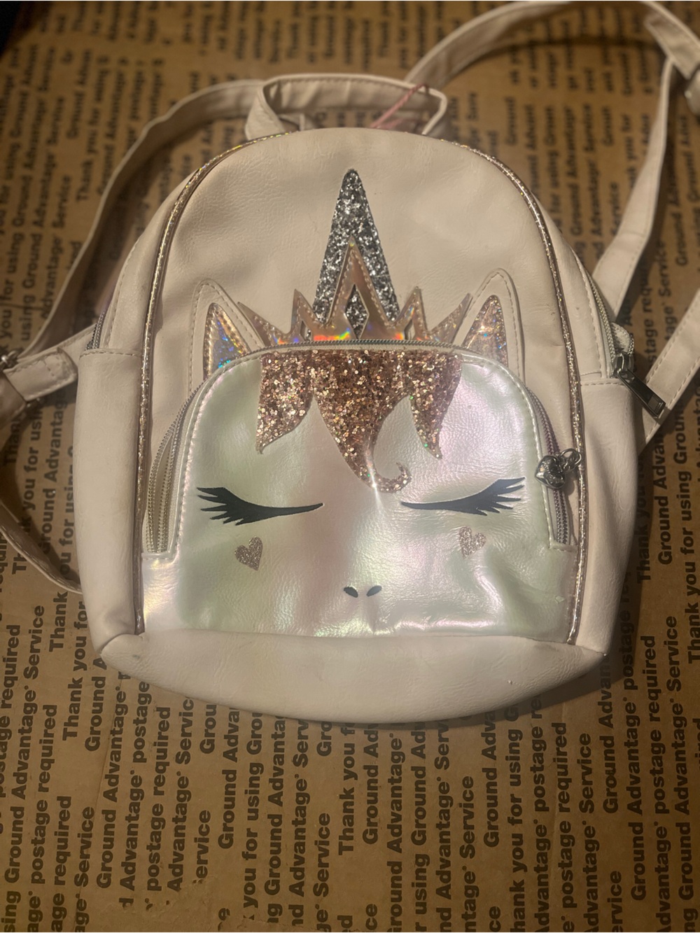Girls Cream Unicorn Mini Backpack with Iridescent Front and Glitter Crown